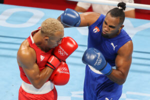 Cuban boxer Arlen López in blue suit